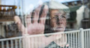 woman with alzheimers and diabetes looking out the window