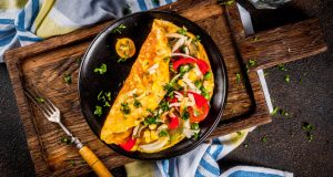 Healthy omelet in a cast iron skillet