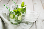 glasses of water with cucumber and mint