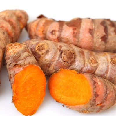 an image of raw turmeric root